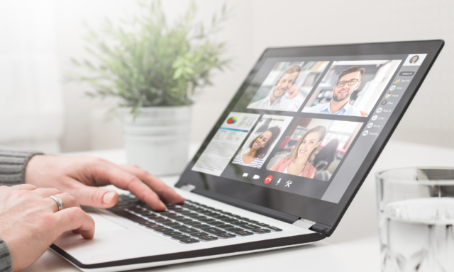 View of a laptop with a virtual conference in process.