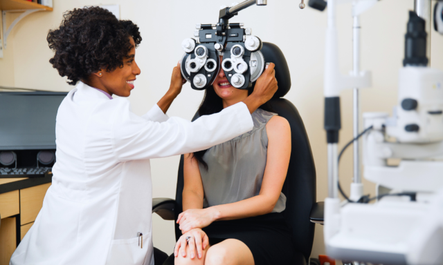 A patient having an eye exam with an optometrist.