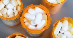 Resources for Prescribing Oral Pharmaceuticals in Optometric Practice View from above of several open prescription pill bottles