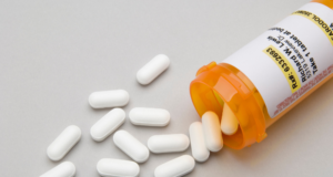 NOV 17 | Virtual CE: Oral Pharmaceuticals Pills spilling out of a prescription bottle on a table