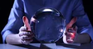 Technology Meets Optometry: Tools That Will Define the Next Decade crystal ball with hands on either side