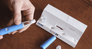 AOA Releases New GLP-1RA Report: What ODs Need To Know About Vision Risks Person's Hands Preparing Semaglutide Ozempic Injection